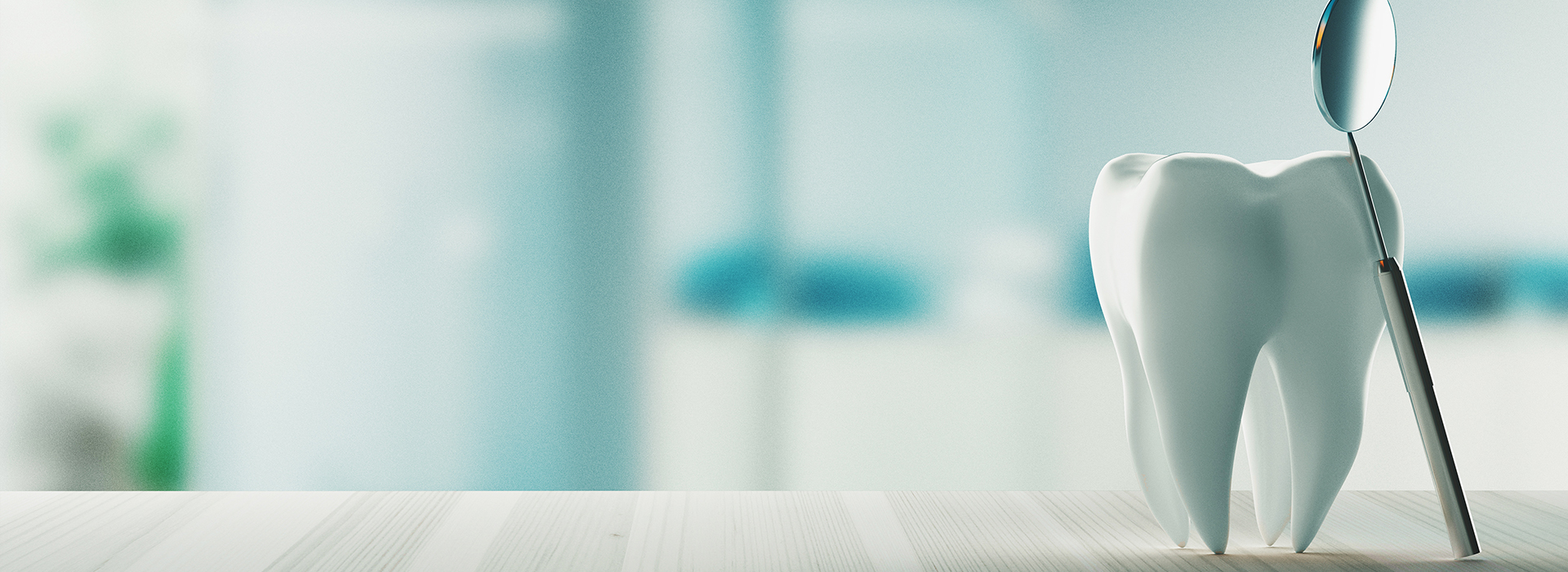 The image features a dental office setting with a toothbrush and a model of a human mouth in the foreground, and a blurred background that includes a toothbrush holder, toothpaste tube, and what appears to be a dental mirror.